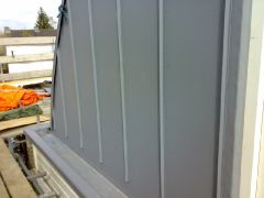 Gevel & goot van woning bekleed met pvc