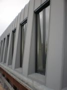 Gevel met pvc + roeven zink-look te bergen op Zoom
